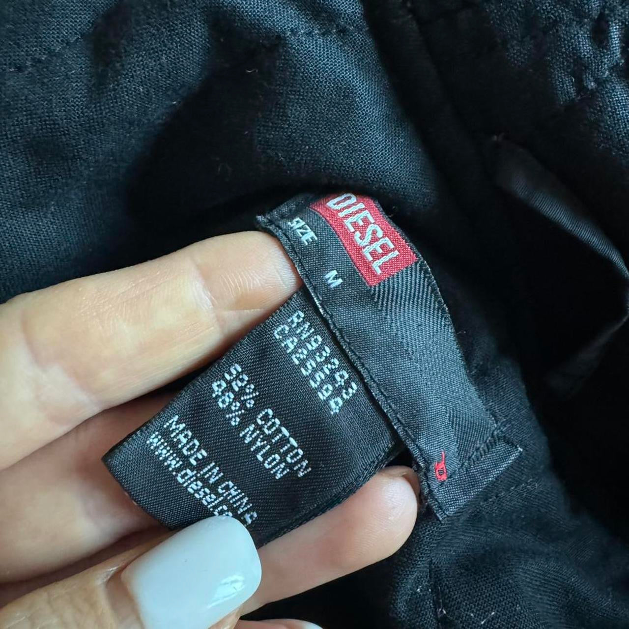 Diesel black fitted puffer coat M